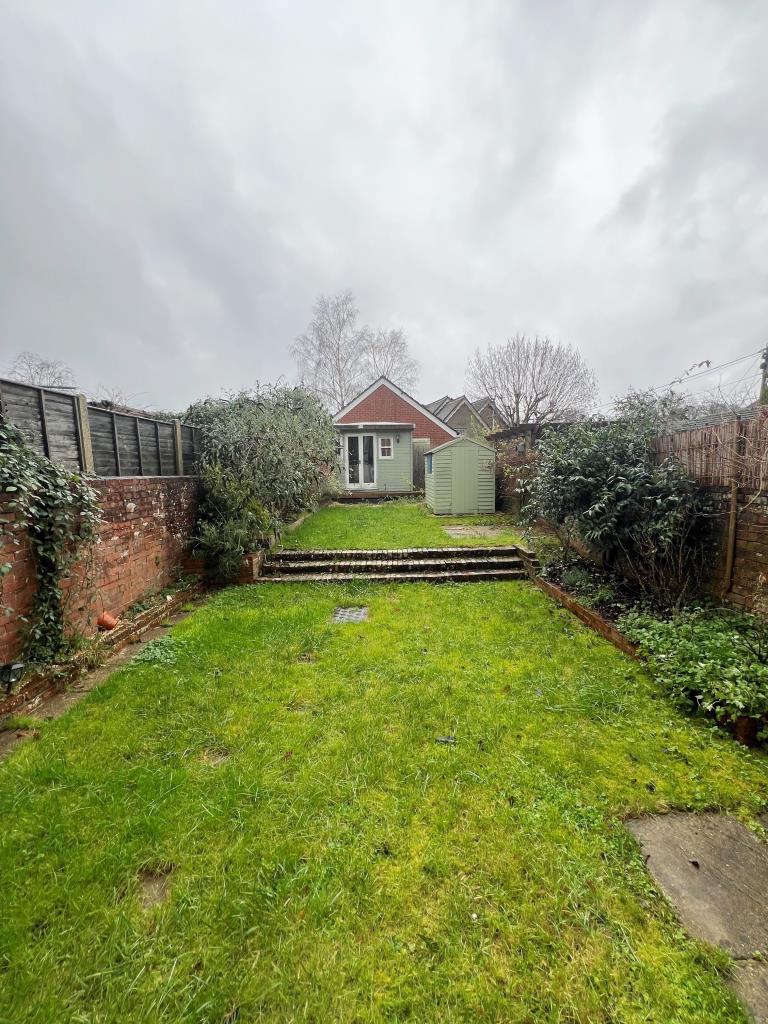 Lot: 79 - GARDEN FLAT IN POPULAR VILLAGE - Garden with outside storage